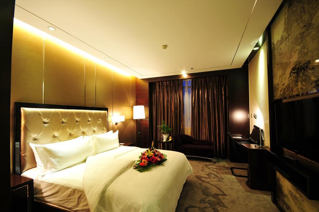 Xichang Minshan Hotel Habitación foto